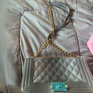 gold and silver new cross bag